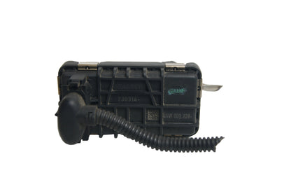 A black plastic automotive switch module with a corrugated black cable attached, photographed on a plain white surface.